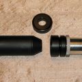 Aluminium frame adapter (stub type) with two piece black Delrin TPR and moderator, side view showing juggled split ready for attachment