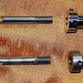 Valve stem and hat, original and Leupy replacement 